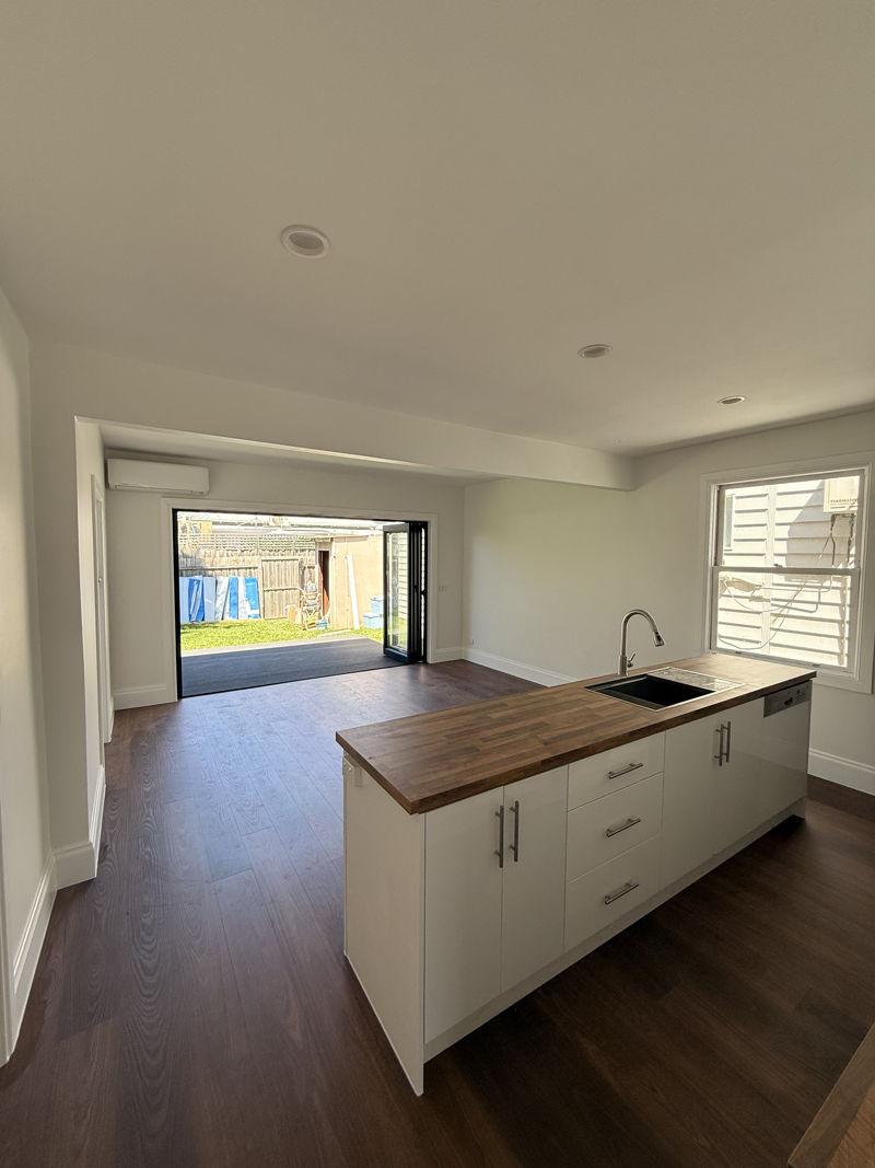 Kitchen after custom carpentry renovation in Melbourne